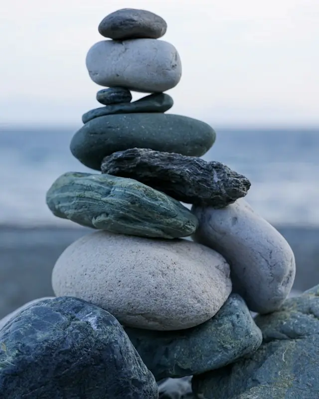 A stack of rocks sitting on top of a beach